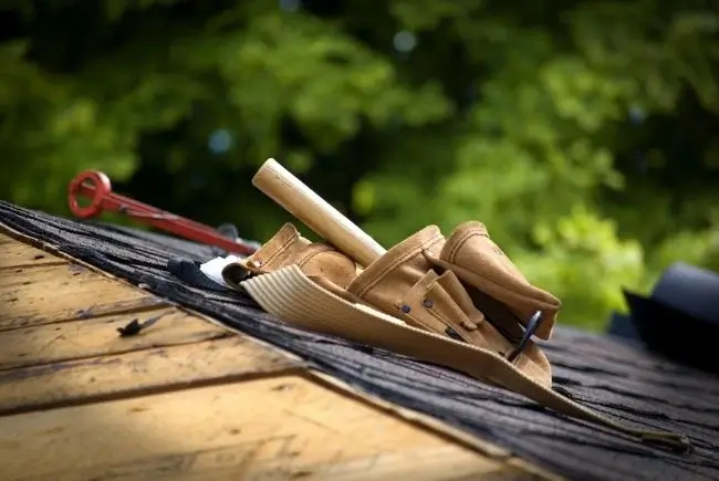 roof repair tools on a roof