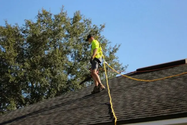 roofer walking on a roof